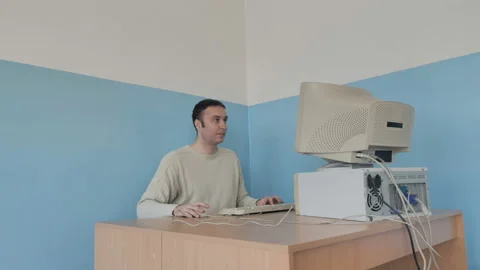 Man Working On His Computer Gets Angry Because Something Goes Wrong Stock Footage 126095504