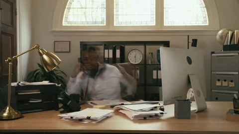 Man working on his desk time lapse Stock Footage 264318592