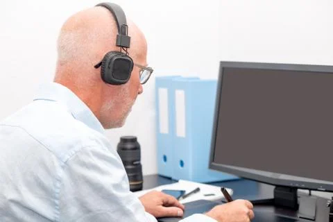 Man working on his graphics tablet Stock Photos