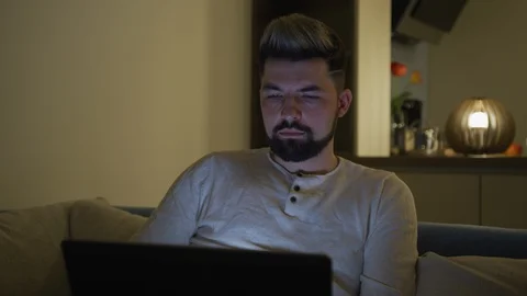 Man working on his laptop Stock Footage 100001517