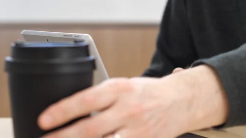 A man working on his laptop in the office Stock Footage 124488285