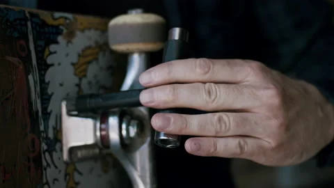 Man Working On His Skateboard Stock Footage 133622006