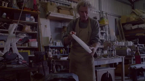 Man working in his workshop Stock Footage 278991974