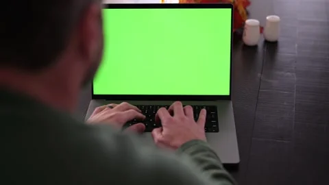 Man Working from Home- Custom Green Screen Laptop Stock Footage 322079477