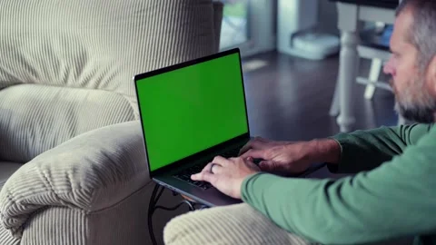 Man Working from Home- Custom Green Screen Laptop Stock Footage 322079496