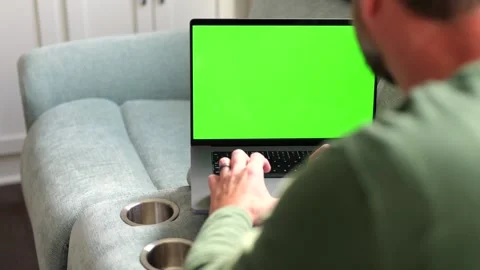 Man Working from Home- Custom Green Screen Laptop Stock Footage 322079534