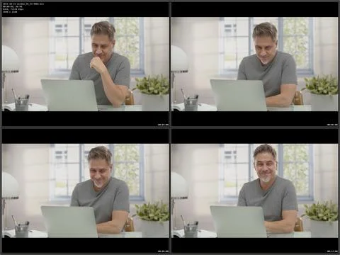 Man working home with desktop computer Stock Photos