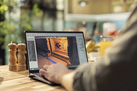 Man working from home, game developer, design interactive gaming software Foto stock