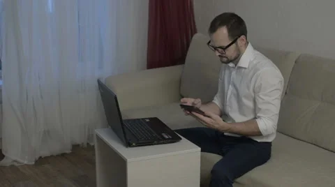 Man working from home with laptop Stock Footage 58098191