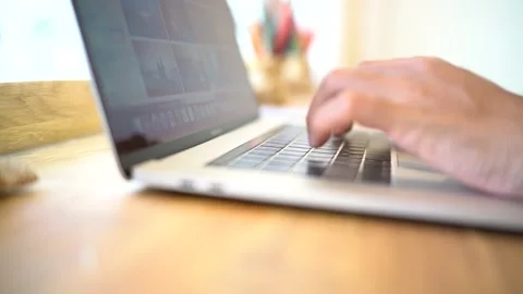 Man working at home office hand on keyboard close up Stock Footage 137645678
