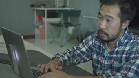 A man working from home use laptop in home Stock Footage 146589273