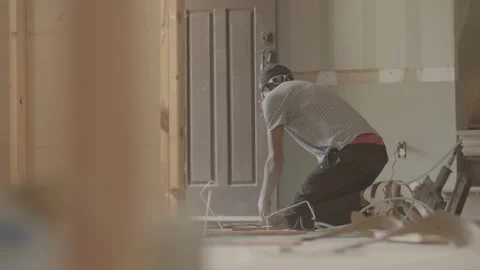 Man working on a house remodel Stock-Footage 146195584