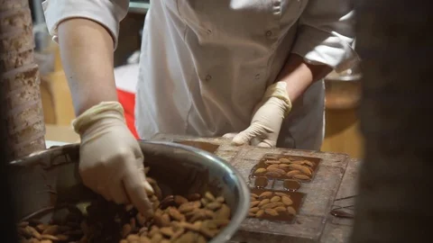 Man working inside of the Chocolate Factory store Stock Footage 91250610