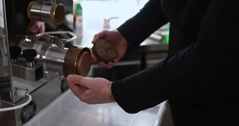 Man working inside pasta factory changing the type of pasta on the machine Stock-Footage 162550493
