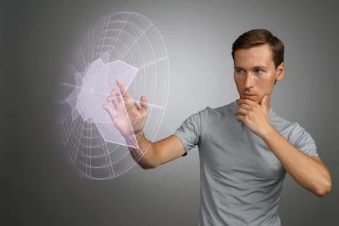 Man working with interactive Sci-Fi HUD interface Stock Photos