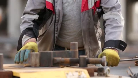 The man is working with iron 2 Stock Footage 318950130