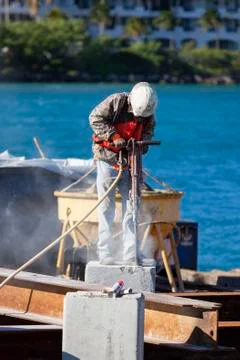 Man working with jackhammer Stock Photos