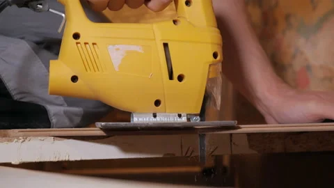 Man working with jig saw Stock Footage 100152523