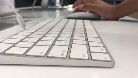 Man working on keyboard Stock Footage 73706295