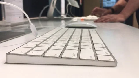 Man working on keyboard Stock Footage 73706367