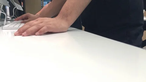 Man working on keyboard Stock Footage 73706406