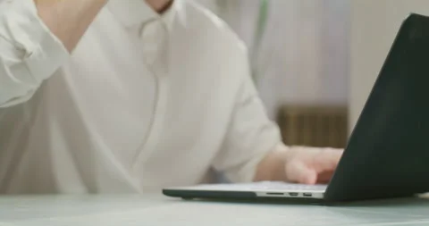 Man working on laptop and drinking coffee. Stock Footage 199791624