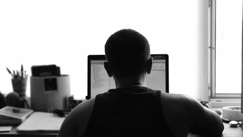 Man Working on Laptop, Back View, black and white. businessman or developer.. Stock Footage 320614467