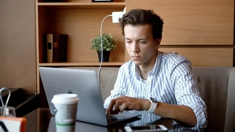 Man Working On Laptop In Cafe Stock Footage 109097721