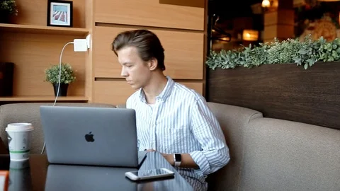 Man Working On Laptop In Cafe Stock Footage 109097750