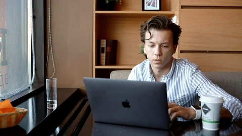 Man Working On Laptop In Cafe Stock Footage 109097786