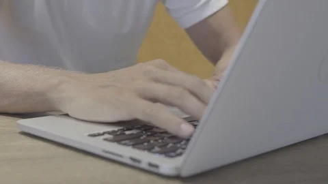 Man working at laptop computer Stock Footage 88588926