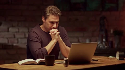 Man working with laptop computer at home office Stock Footage 131851632