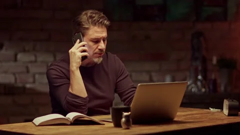 Man working with laptop computer at home office 库存影片 143112213