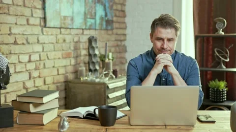 Man working with laptop computer at home office 스톡 동영상 143112667