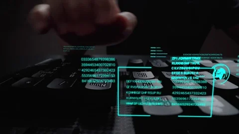 Man working on laptop computer keyboard with graphic user interface GUI hologram Stock Footage 127326719