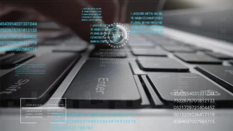 Man working on laptop computer keyboard with graphic user interface GUI hologram Stock Photos