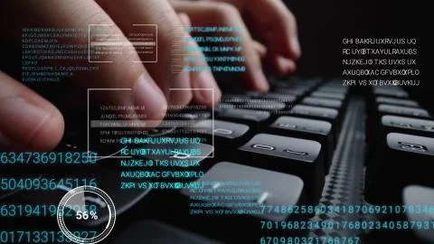 Man working on laptop computer keyboard with graphic user interface GUI hologram Stock Photos