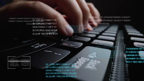 Man working on laptop computer keyboard with graphic user interface GUI hologram Stock Photos