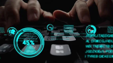 Man working on laptop computer keyboard with graphic user interface GUI hologram Stock Photos