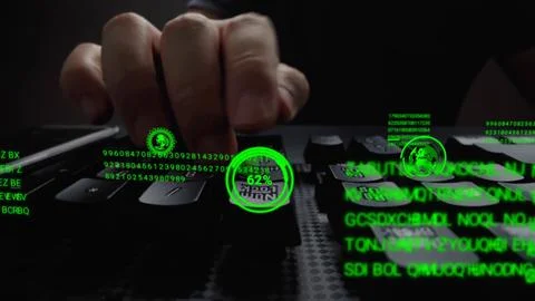 Man working on laptop computer keyboard with graphic user interface GUI hologram Stock Photos