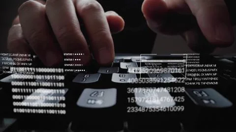 Man working on laptop computer keyboard with graphic user interface GUI hologram Stock Photos