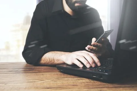Man working with laptop computer Stock Photos