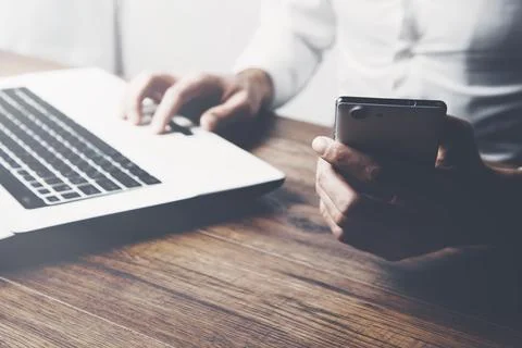 Man working with laptop computer Stock Photos