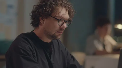 Man Working on Laptop During Night in Office Stock Footage 236995195