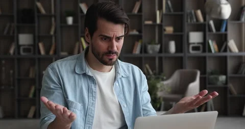 Man working on laptop feels angry due no internet access Stock Footage 146278064