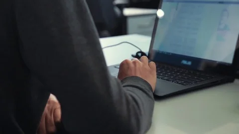 Man working on laptop Stock Footage 76000344
