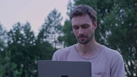  A man is working on a laptop Stock Footage 156407102