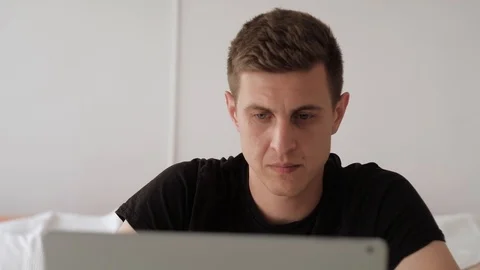 Man working on laptop, front close up Video stock 122543282