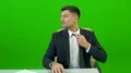 The man working with a laptop on the green background 4k or 4k+ Resolution