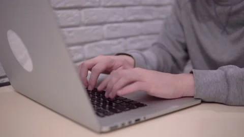 Man working with laptop, hands typing keyboard, freelancer office remote work Stock Footage 138757484